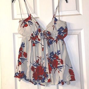 No Boundaries Spaghetti Strap Floral Top with openings on each side